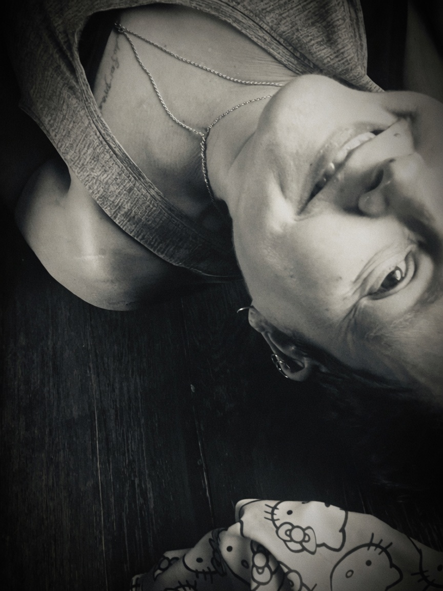 Kailee Reese Samuels on the floor with Hello Kitty